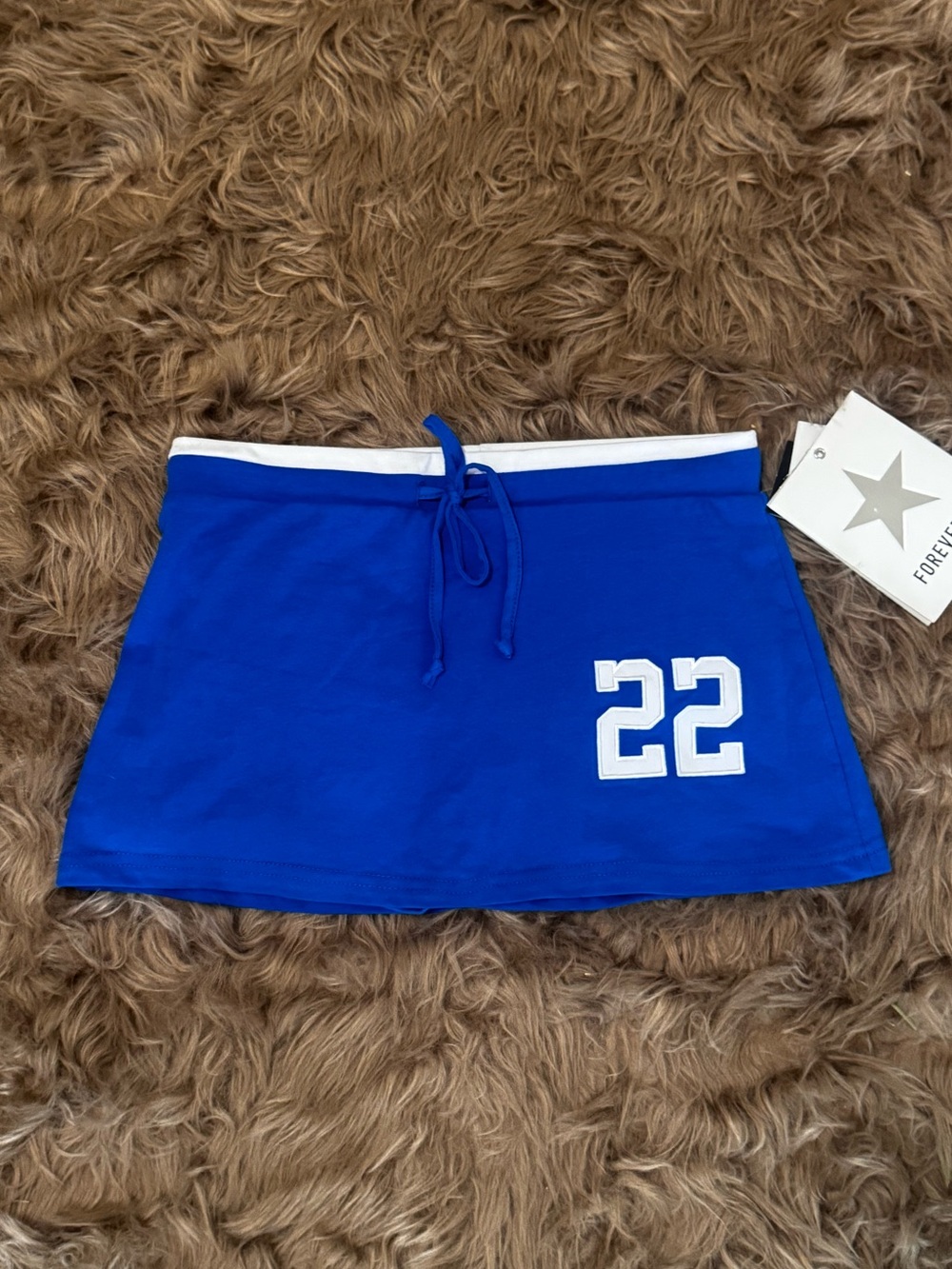 Y2K style blue mini skirt white waistband number 22 logo